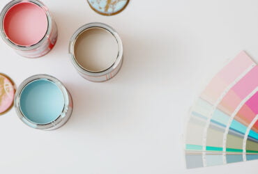 Interior House Painting Minneapolis MN - Paint Cans with Pastel Colors and Paint Samples