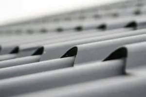 How to Select the Best Roofing Material for High Winds and Hurricanes Black roof tiles.