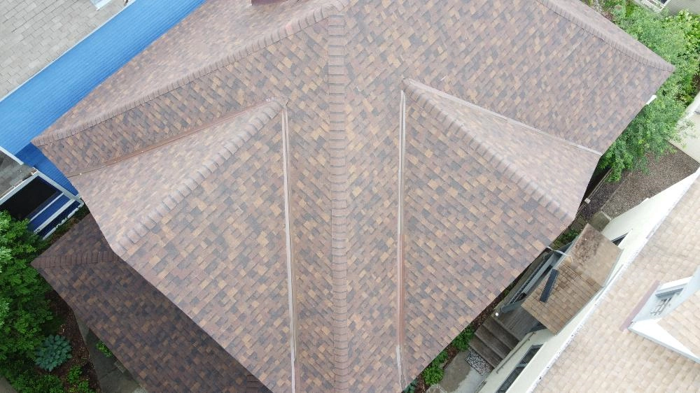 Jordan Roofing Company - Professional Roofing Services 1 Overhead view of a roof after roof repair by Jordan Roofing Company
