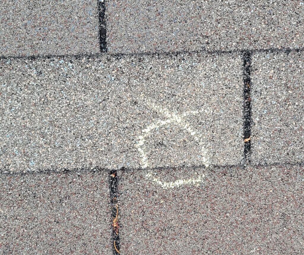 New Brighton 13 Hail damage on a roof in New Brighton, MN