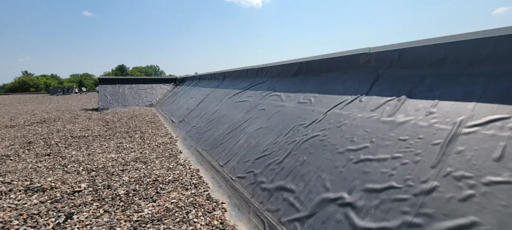 Commercial Roofing Company Saint Paul, MN Flat roof with gravel surface.