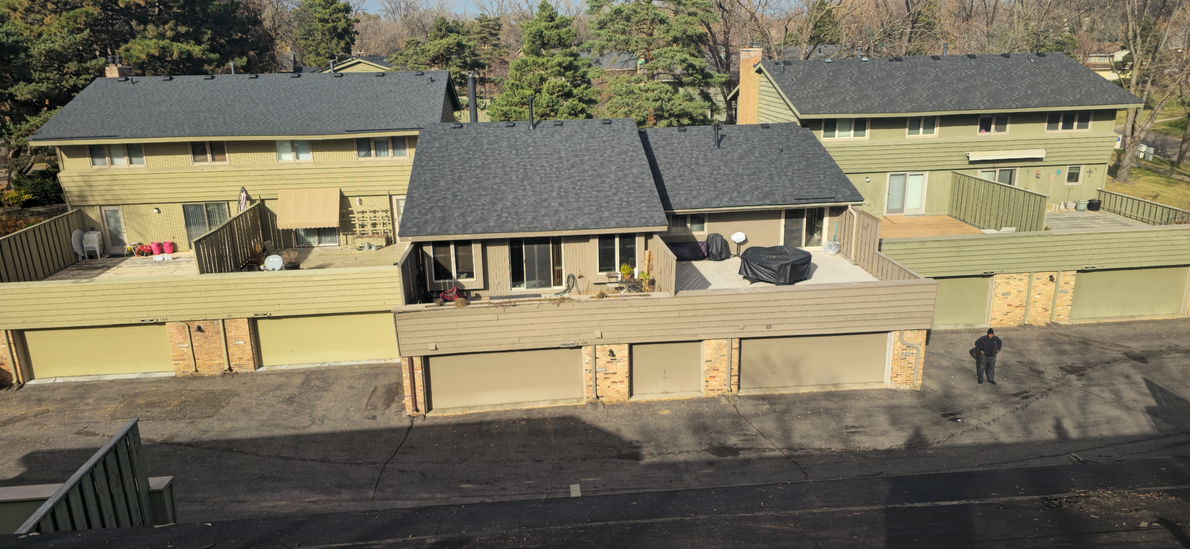 Sellers Roofing crew repairing storm-damaged roof on a Columbia Heights, MN residential home