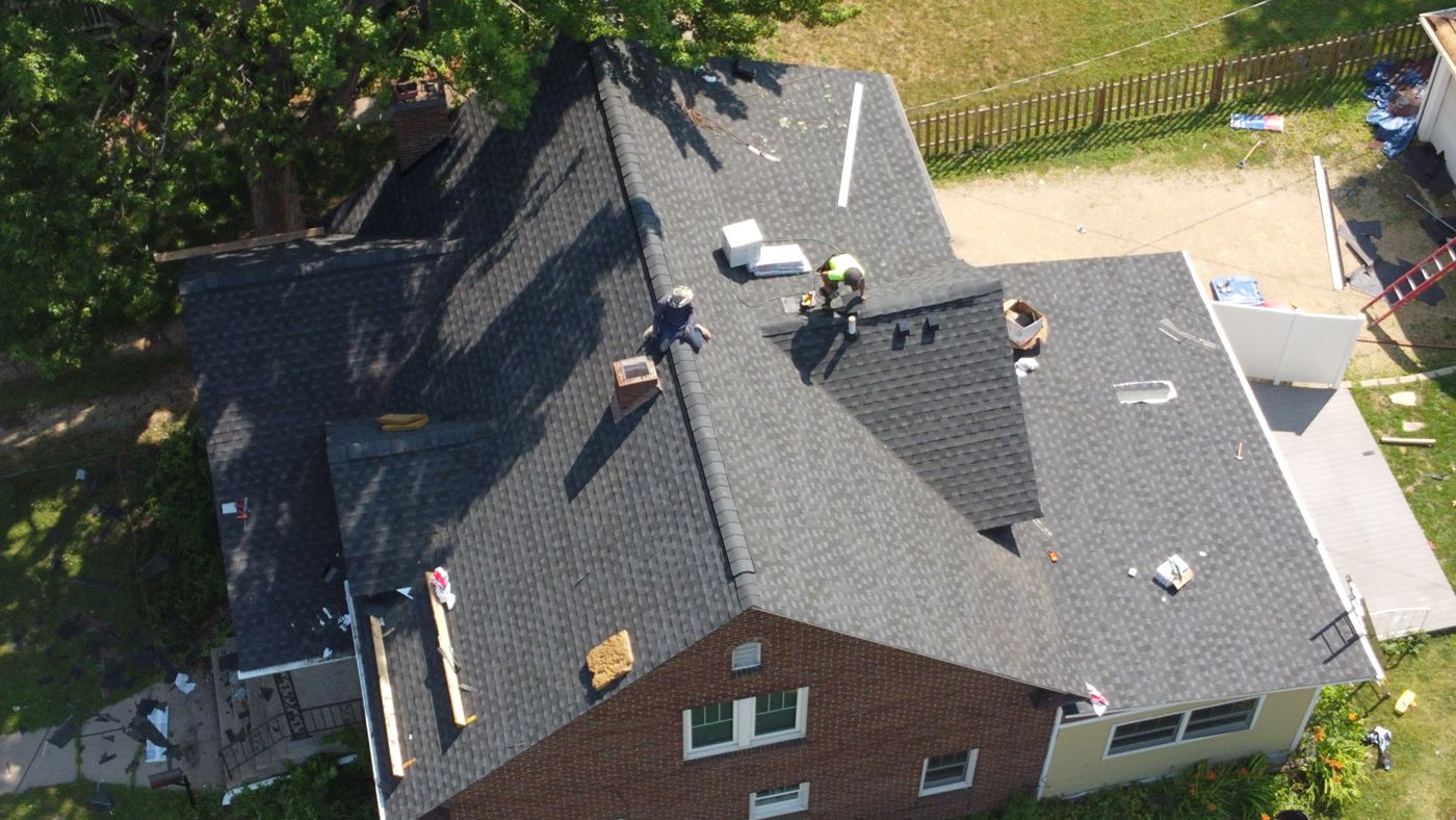 Commercial & Residential Roofing in Saint Paul, MN | Sellers Roofing Completed roof replacement on a split-level home by Sellers Roofing in Red Wing, MN