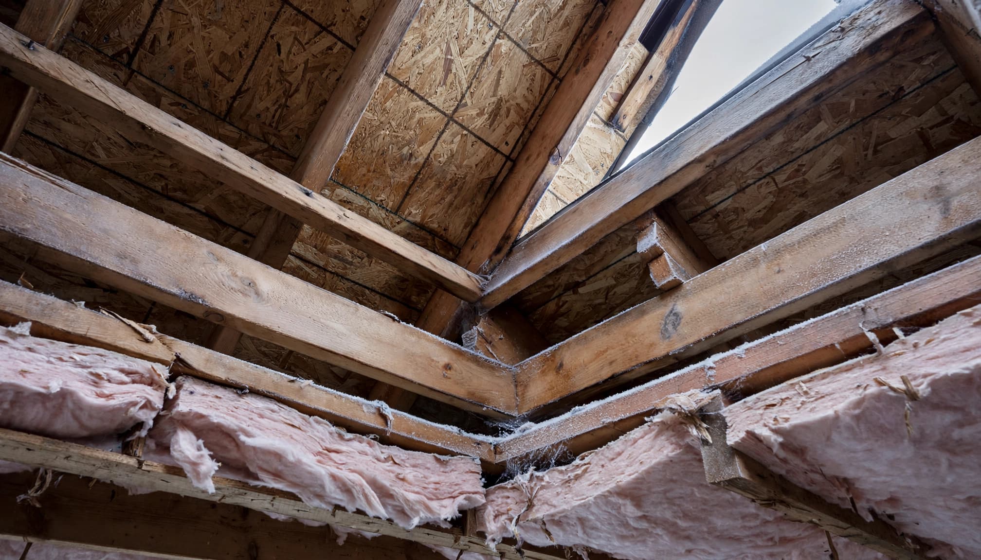 Can Ice Dams Form Around Dormers on St. Paul Homes? Attic-side inspection area beneath ice dams around dormers on Saint Paul homes.