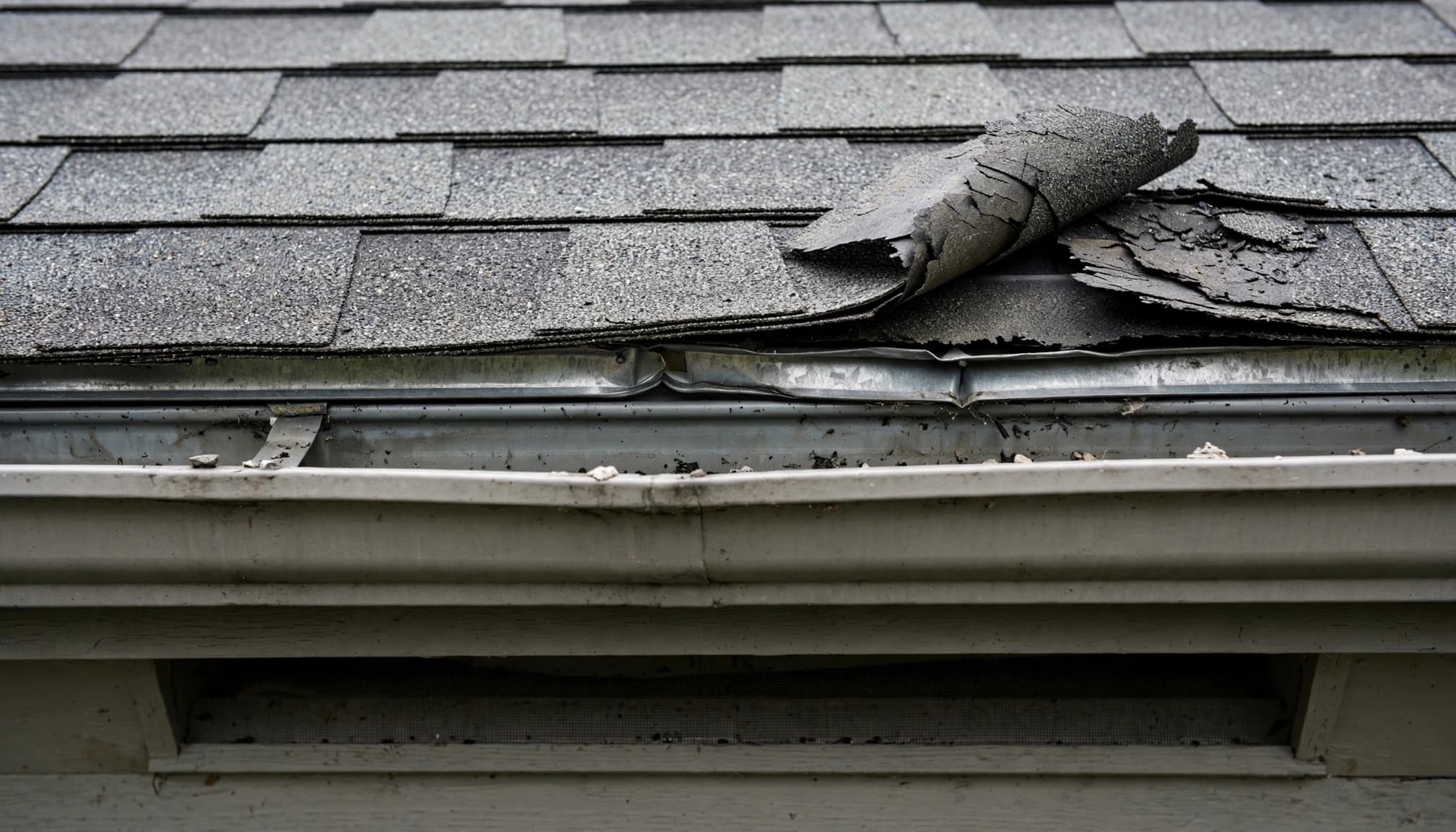 Can Freeze-Thaw Open Gaps Between Asphalt Shingle Courses? Roof eave, drip edge, and gutter detail for inspecting asphalt shingle gaps in the Twin Cities
